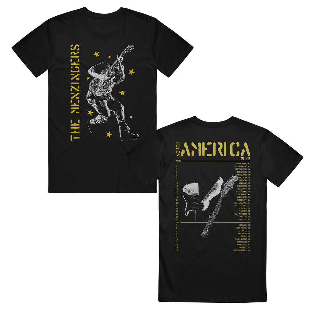 image of the front and back of a black tee shirt on a white background. front of tee is on the left and has a full body print in yellow on the left side vertically says the menzingers with yellow stars all over and in white an image of a man playing a guitar. the back of the tee is on the right and has in yellow at the top 2022 america with the list of tour dates and locations below and a broken guitar in the center